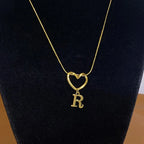 Choker necklace with initial letter and heart pendant