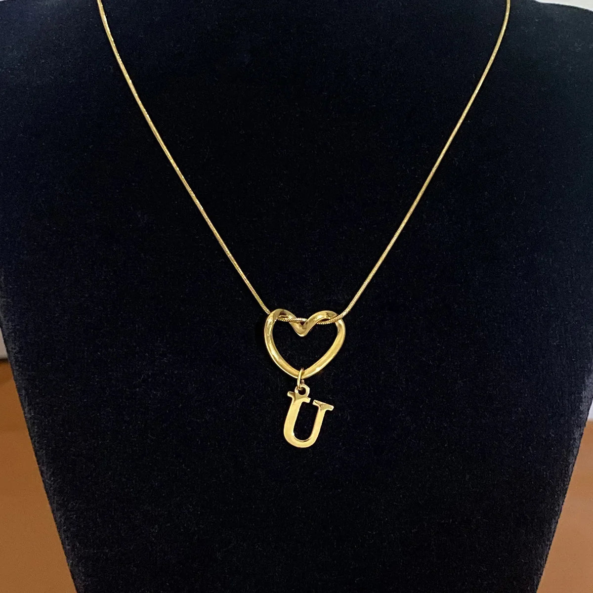 Choker necklace with initial letter and heart pendant