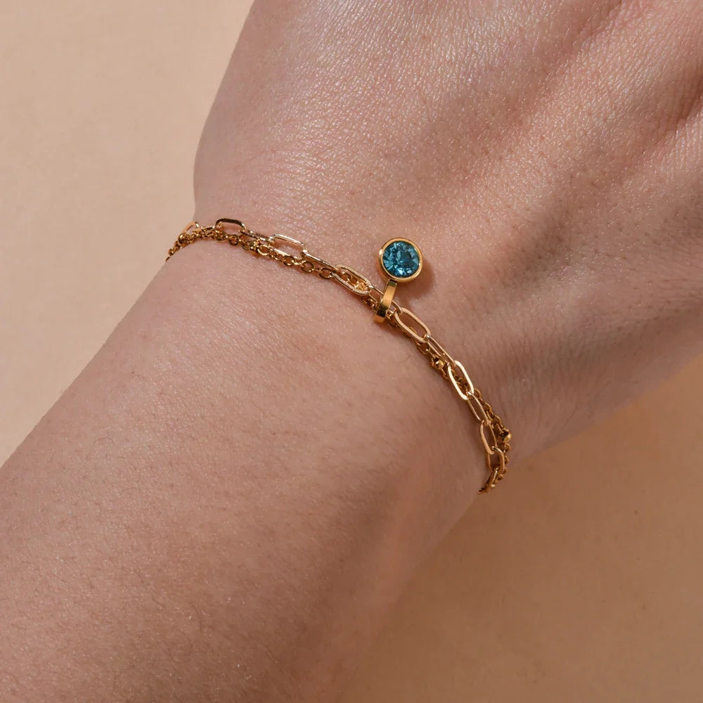 Double bracelet doré avec pierre de naissance