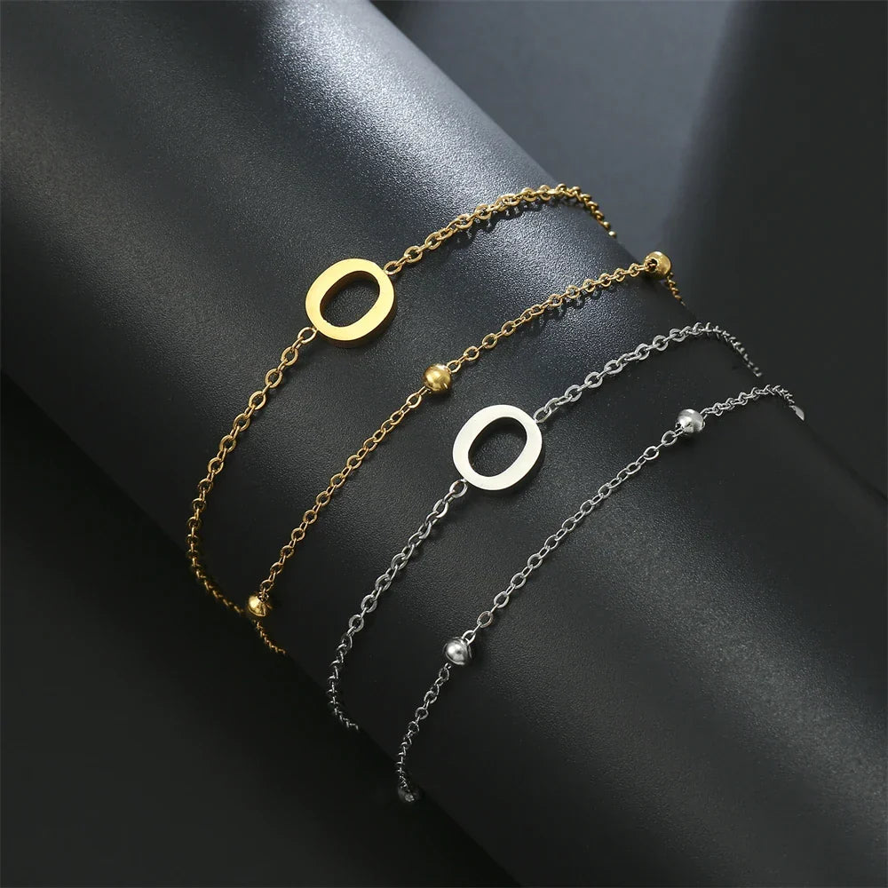 Bracelet double initiale or et argent  o