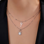 Double necklace with key and padlock pendant