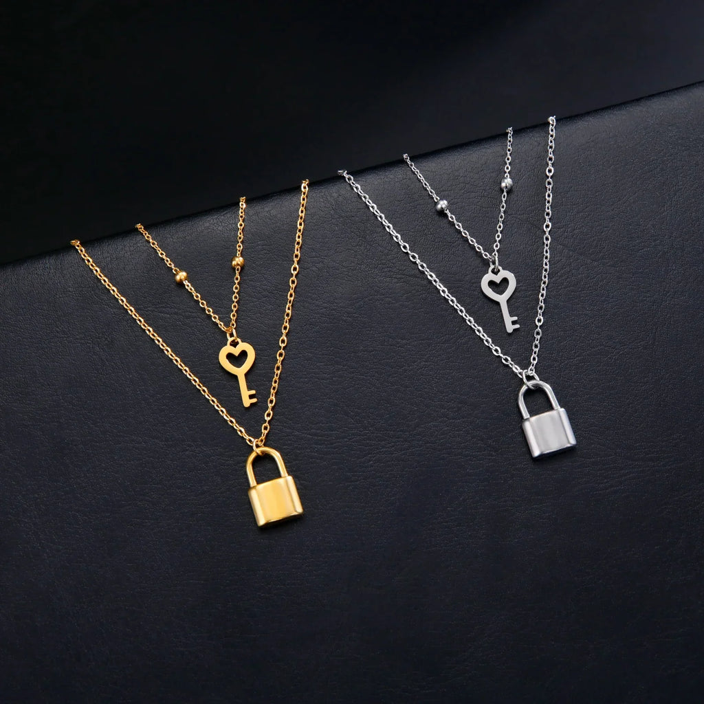 Double necklace with key and padlock pendant