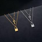 Double necklace with key and padlock pendant
