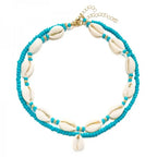 Double collier coquillage cauri turquoise