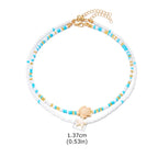 Double collier coquillage et perles colorées