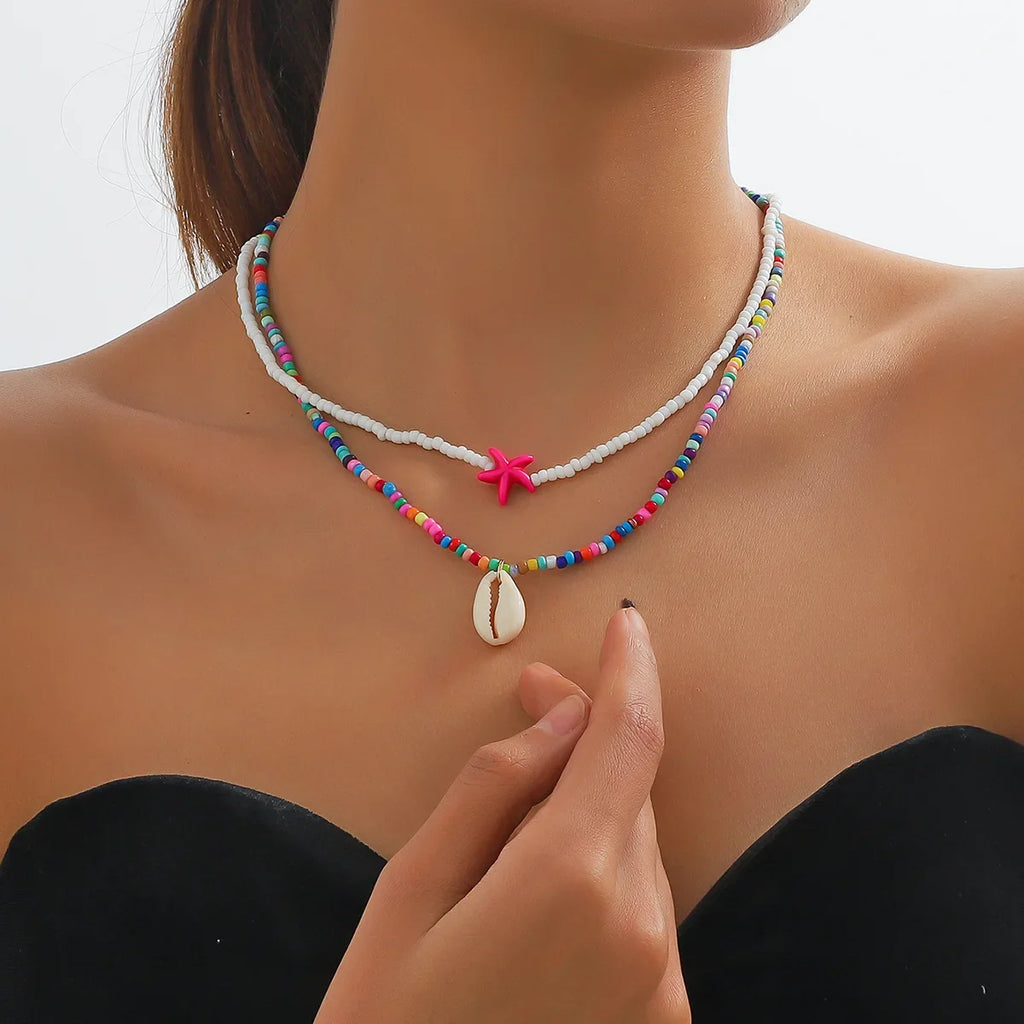Collar doble de conchas y perlas de colores 
