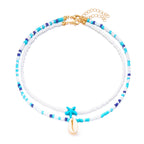 Collar doble de conchas y perlas de colores 