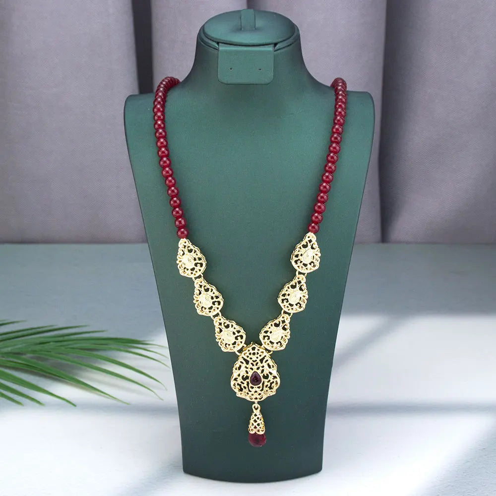 Collar largo con colgante dorado tradicional árabe 