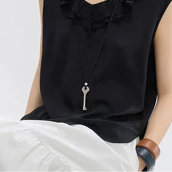 Long rope necklace with key pendant