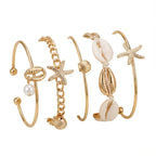 Lot de 5 bracelets coquillage et étoile dorés